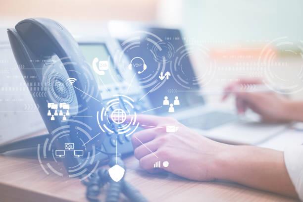 VOIP desk phone with digital communication icons
